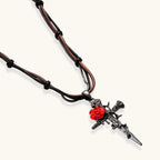 Gothic jewelry set with dark metal thorny cross pendants featuring red enamel roses and matching red crystal earrings