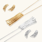 Gold-toned cascade jewelry set with flowing textured strands, featuring drop earrings and matching pendant necklace